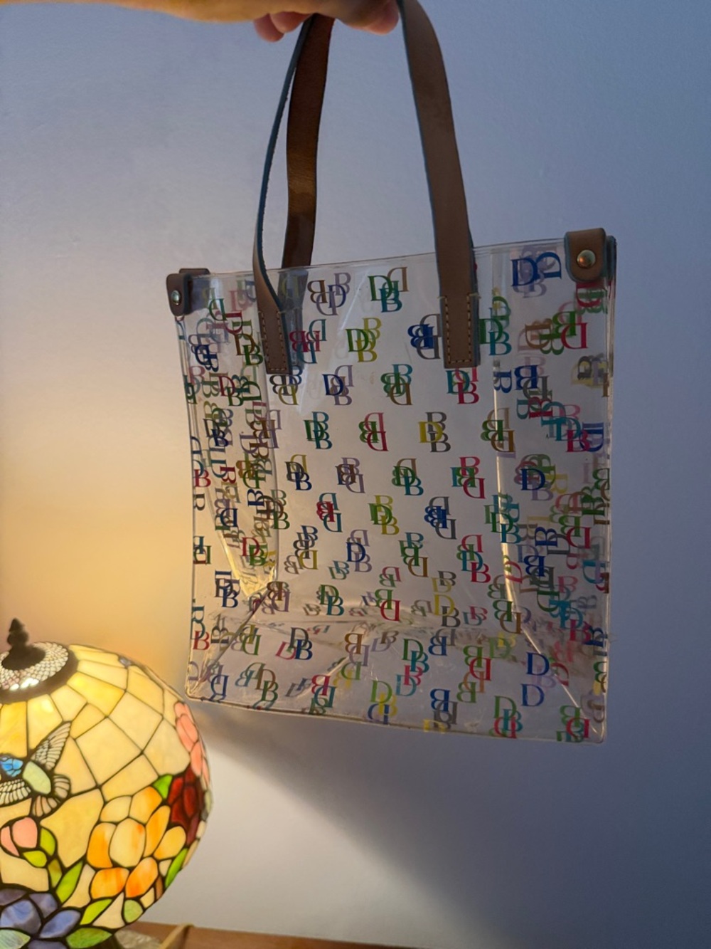 Dooney & Bourke Clear Tote with Multicolor DB Logos and Brown Handles - Picture 5 of 6